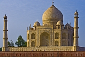 caption: Taj Mahal at Dawn across the Yamuna River