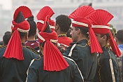 caption: Indian Soldiers With Red Turbans and Black Uniforms